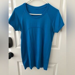 Swift tech shirt waist length size 8